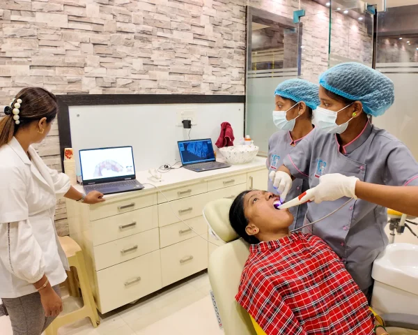 Dentist consulting with a patient